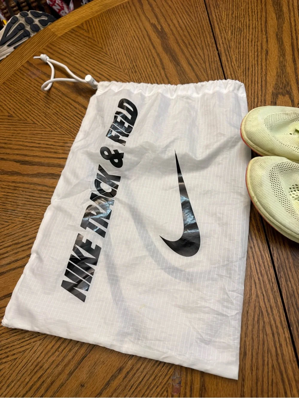 Nike Racing Shoes - Light Green with Orange Swoosh
